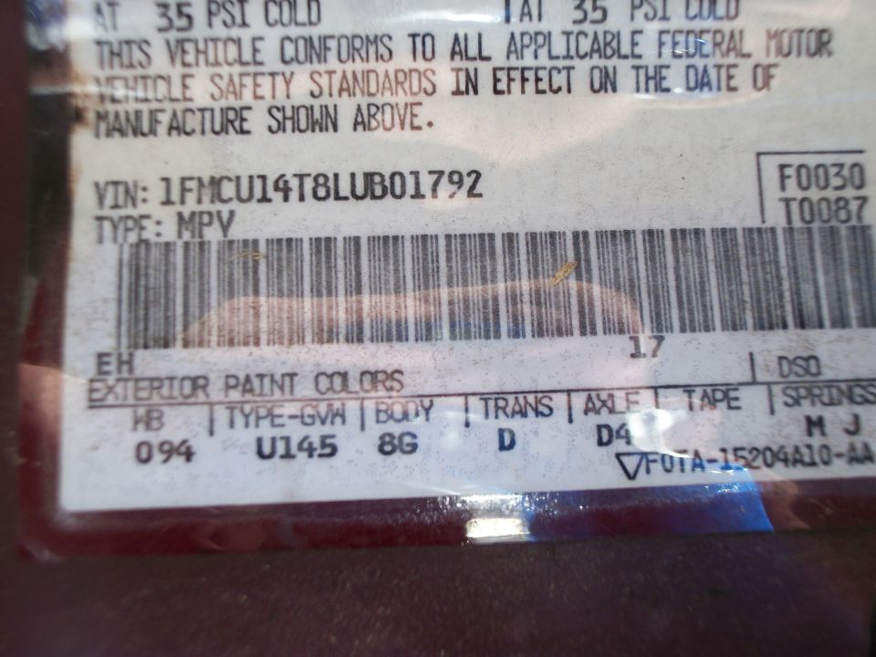 Ford certification label with VIN 1FMCU14T8LUB01792, type MPV, and body, trans and axle codes