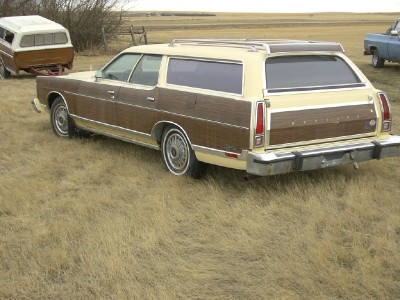 1978 Mercury Colony Park - This 1978 Mercury Colony Park station wagon features classic wood paneling and is seen from the rear.