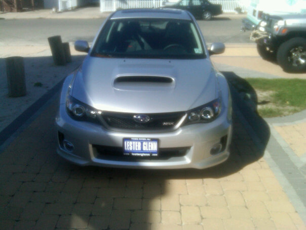 Silver 2011 Subaru Impreza WRX front view with license plate LESTER GLENN