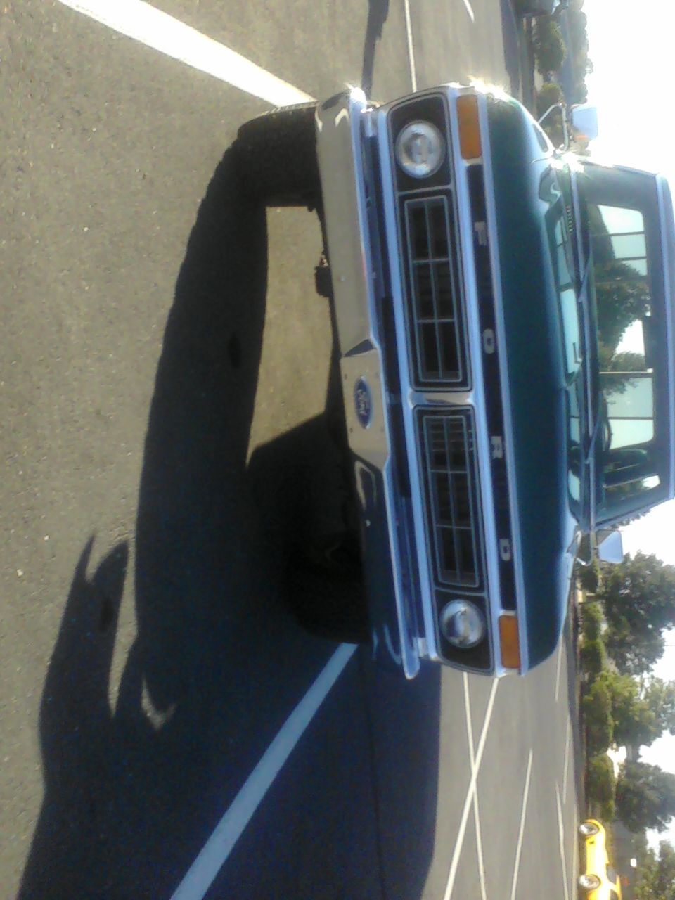 Green 1977 Ford F-Series truck front view