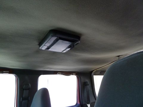 1993 Ford C-150 (Centurion Conversions) - The overhead console with interior lighting is visible in this vehicle's cabin.