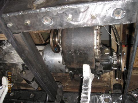 1961 International Scout 800 - Close-up view of vehicle drivetrain components, including a transmission and transfer case, with a date stamp visible.