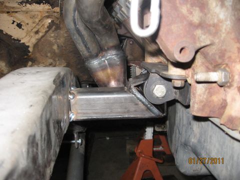 1961 International Scout 800 - Custom engine mount and exhaust manifold fabrication shown on jack stands, dated 01/27/2011.