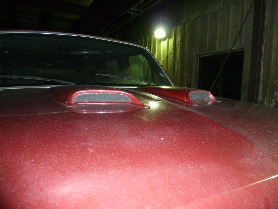 Red truck hood with dual scoops