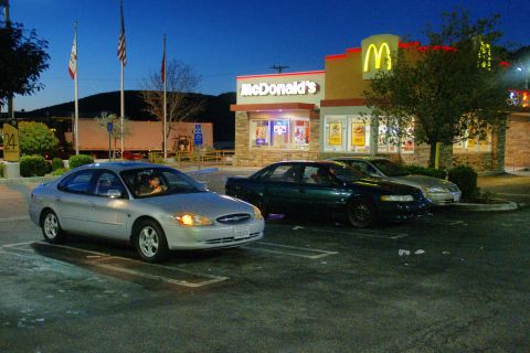 1995 Ford Taurus - A silver 2000 Ford Taurus is parked in front of a McDonald's.