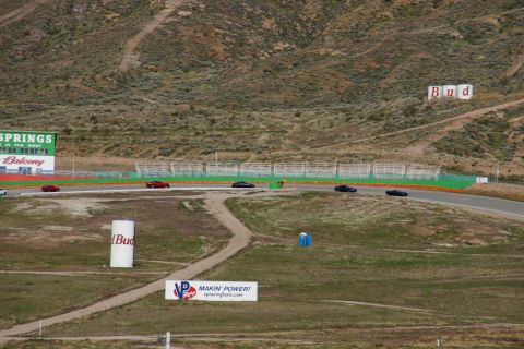 1995 Ford Taurus - Cars compete on a race track, with various advertisements visible in the surrounding landscape.