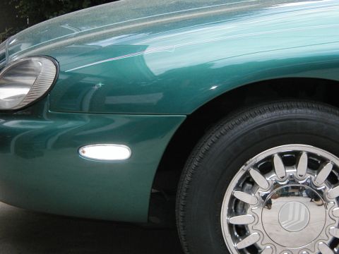 1996 Mercury Sable - Drive side front fender, after excellent repair by Colorado Coach. Notice also the change to clear side markers.