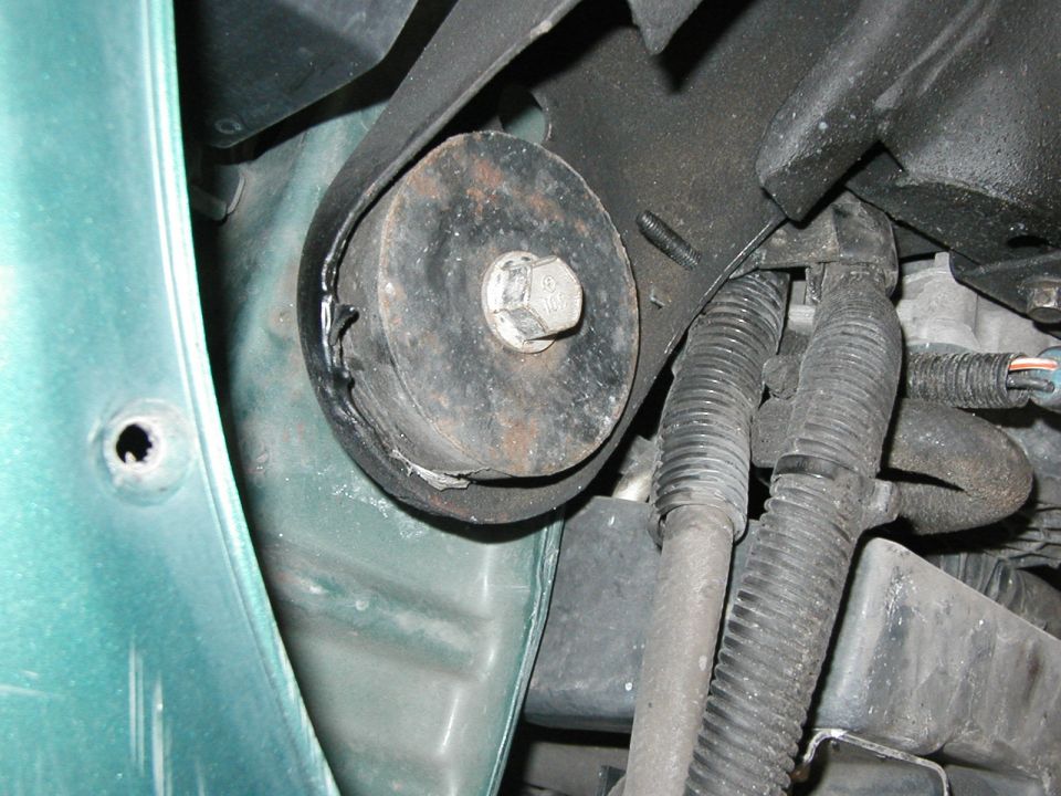 One of the original front subframe bushings.
