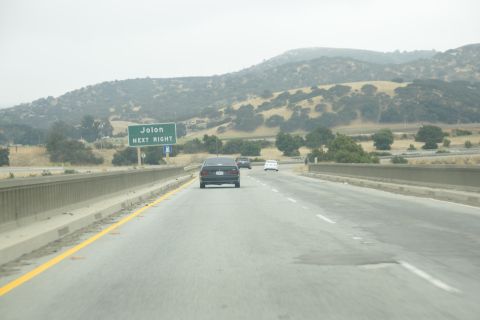 1995 Ford Taurus - Driving on a highway with a sign indicating the exit for Jolon is to the right.