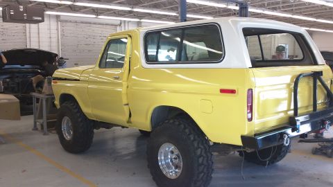 1978 Ford Bronco - This 1978 Ford Bronco features a two-tone yellow and white paint scheme and a rear bumper.