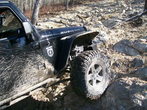 2007 Jeep Wrangler - This 2007 Jeep Wrangler Rubicon, adorned with a Call of Duty decal, navigates a challenging rocky trail.