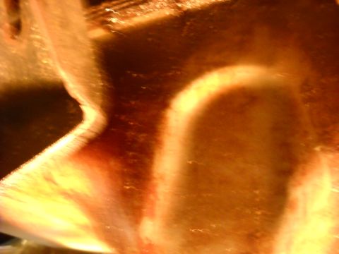 1993 Ford C-150 (Centurion Conversions) - Abstract view of a metallic component, possibly from an engine bay.