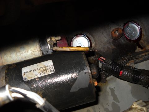 1993 Ford C-150 (Centurion Conversions) - Starter motor and freeze plugs, part of engine assembly.
