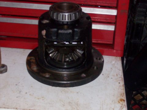 1982 Ford F-100 - Close-up of a differential carrier, a component of a vehicle's drivetrain, with internal gears exposed.