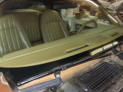 1979 Chevrolet Camaro - Interior view of a 1979 Chevrolet Camaro, showing the tan seats and dashboard.