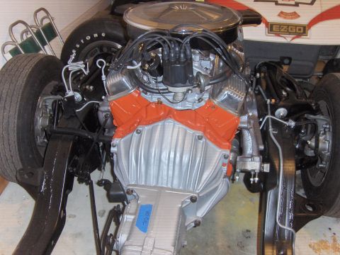 1979 Chevrolet Camaro - Front end of a vehicle's engine and suspension assembly, likely undergoing restoration or modification.
