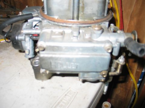 1984 Ford Bronco - This image shows a Holley carburetor, a component of a vehicle's fuel system.