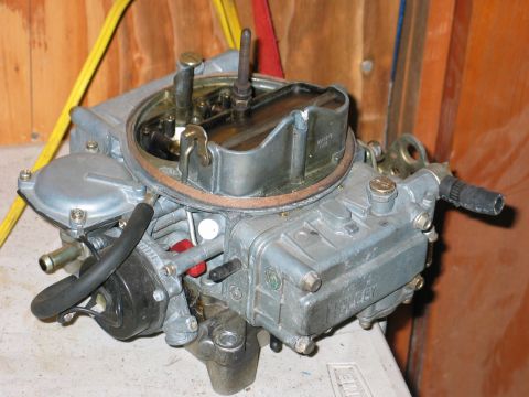 1984 Ford Bronco - A Holley carburetor is shown, a critical component for internal combustion engines.