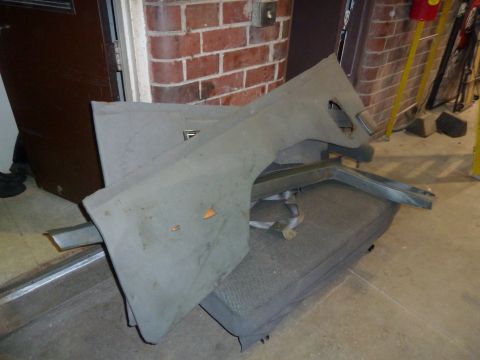 1993 Ford C-150 (Centurion Conversions) - A vehicle fender and frame part are shown, not a complete vehicle.