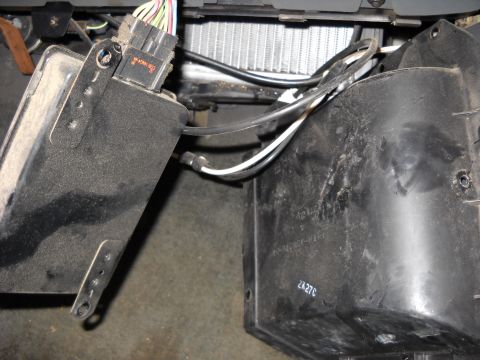 1993 Ford C-150 (Centurion Conversions) - Close-up view of vehicle's heater core and blower motor housing assembly.