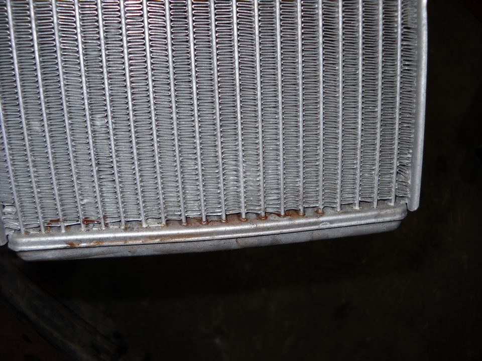 Heater core with visible rust on the bottom edge