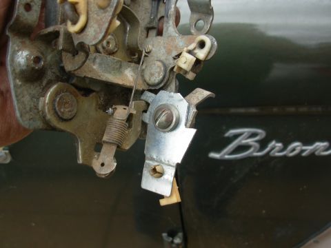 1976 Ford Bronco - A new lever was cut from a steel plate and drilled for the pivot & operating rod. A short sleeve was used to prevent the bolt from clamping…