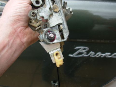 1976 Ford Bronco - A new lever was cut from a steel plate and drilled for the pivot & operating rod. A short sleeve was used to prevent the bolt from clamping…