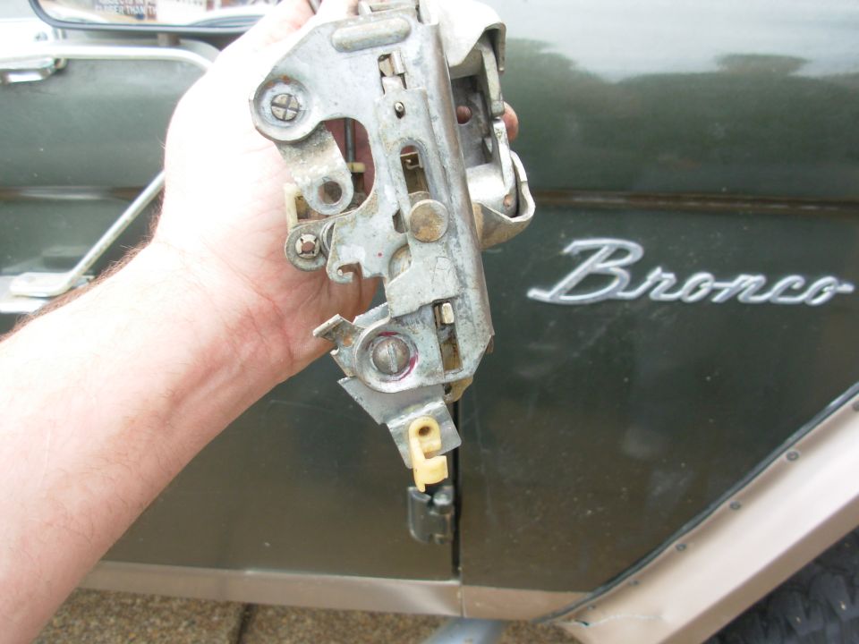 With the bolt reversed, there is no interference with the lock slide.  The nut has red threadlocker to prevent it from vibrating loose.