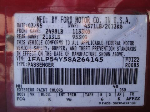 1993 Ford Taurus - Vehicle identification sticker shows a manufacture date of March 1995 and VIN 1FALP54Y5SA264145.