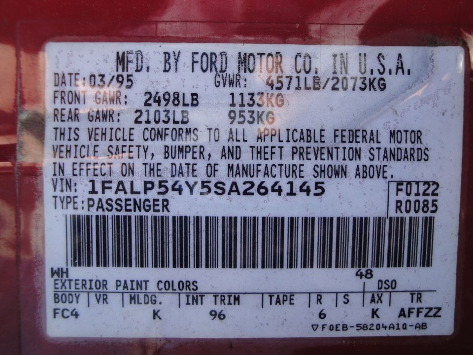 Ford certification label dated 03/95 with VIN 1FALP54Y5SA264145, GVWR, axle ratings and paint and trim codes