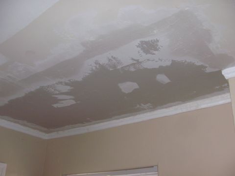 1968 Ford Mustang - A ceiling shows areas of drywall repair and new crown molding.