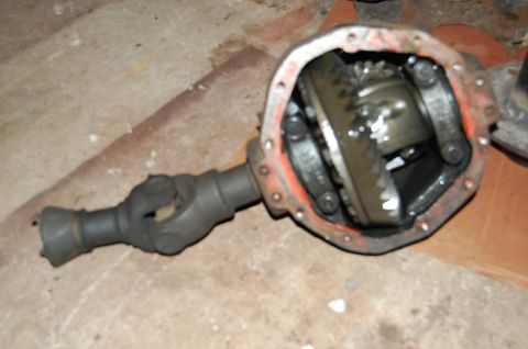 1994 Ford Bronco - Close-up of an open differential housing and part of the driveshaft.