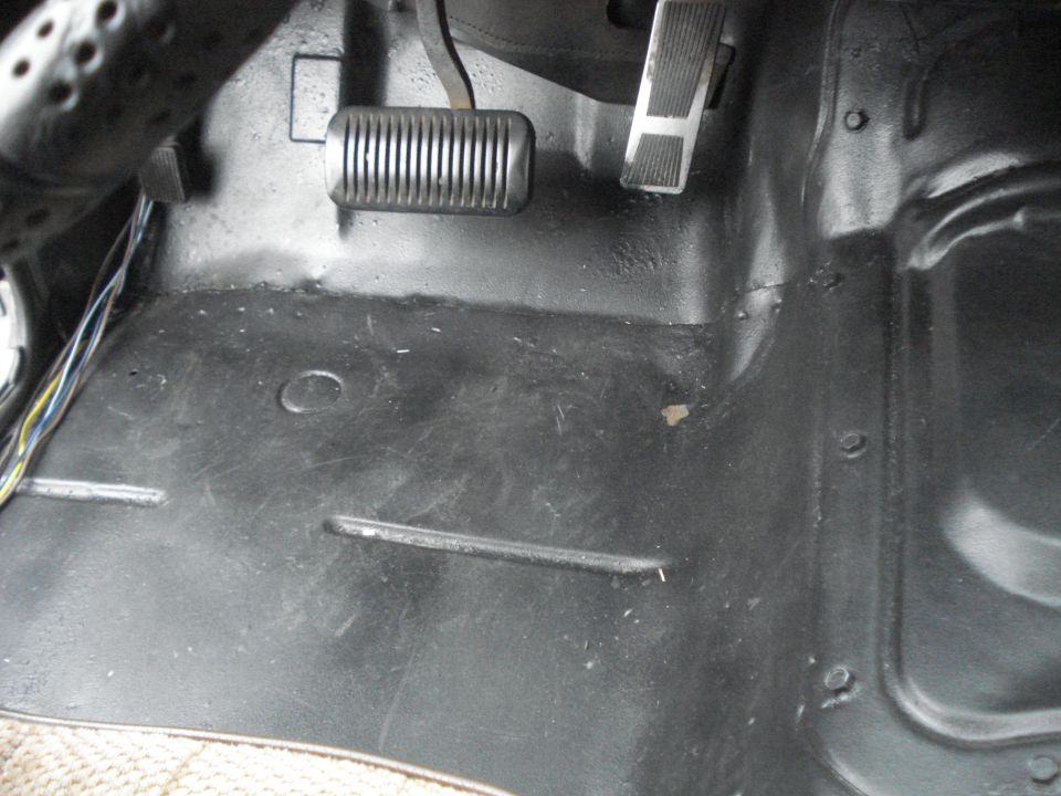 Interior floor and pedals of a vehicle