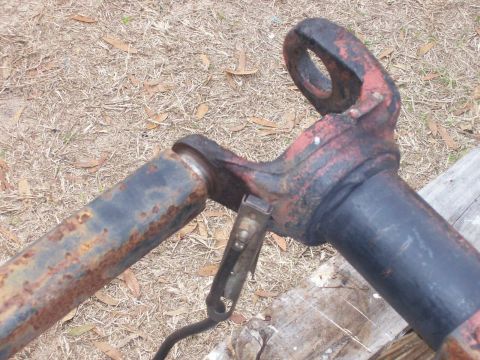 1982 Ford F-100 - A close-up view of a driveshaft component, showing signs of rust and wear.