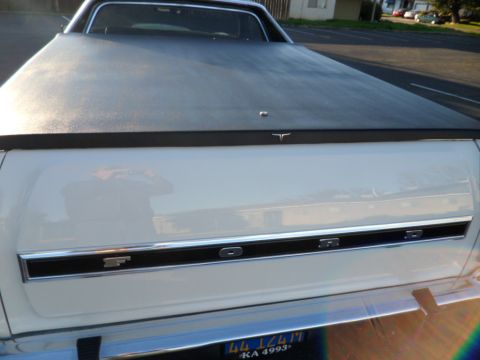 1973 Ford Ranchero - Rear view of a 1973 Ford Ranchero showing the tailgate and tonneau cover.
