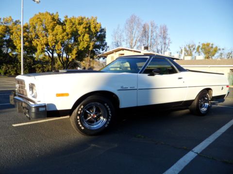 1973 Ford Ranchero - White 1973 Ford Ranchero with black accents and aftermarket wheels.