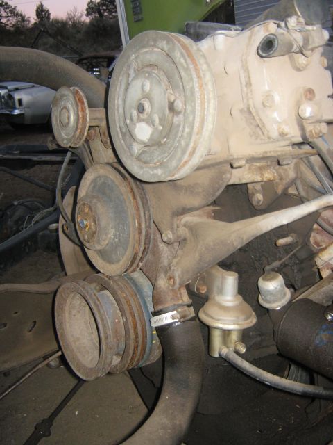 1972 Ford F-250 - Engine pulleys and fuel pump are visible in this close-up shot.