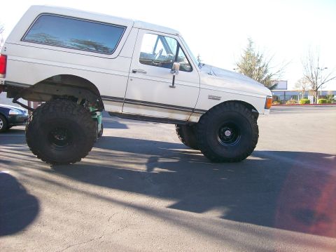 1989 Ford Bronco - This lifted 1989 Ford Bronco features oversized tires and a raised suspension for off-road capability.