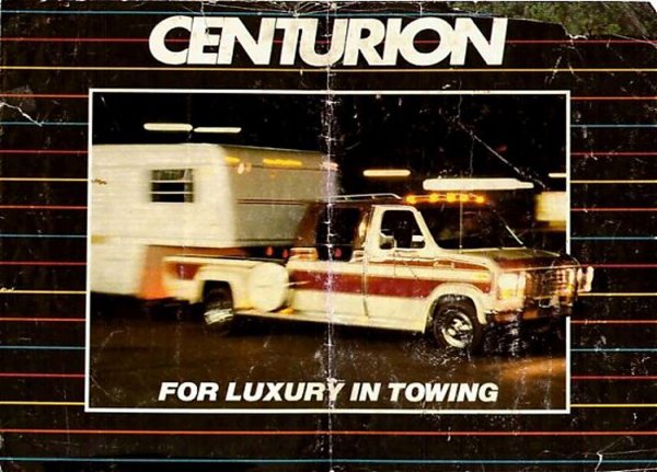 Vintage Centurion brochure cover, white dually crew cab pickup towing a travel trailer
