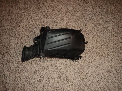 2004 Mercury Grand Marquis - This is a part of a vehicle's air intake system, likely the air filter housing.