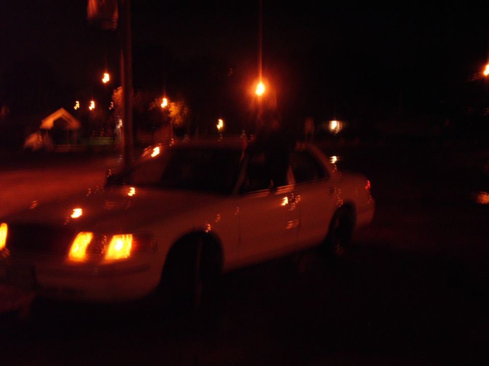 1999 Ford Crown Victoria, 3q-front view at night