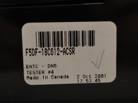 1993 Ford Taurus - A label with a barcode, part number F5DF-18C612-ACSR, and manufacturing date of October 2, 2001.