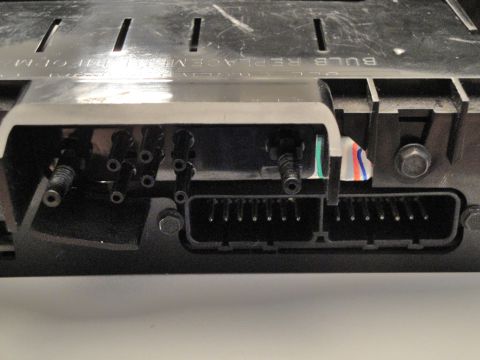 1993 Ford Taurus - This image shows electrical connectors and wiring, with text indicating 'BULB REPLACEMENT INFO'.