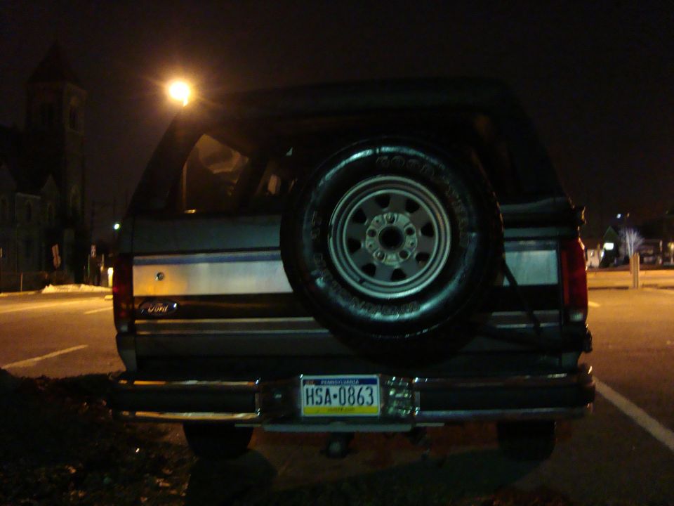 1991 Ford Bronco rear view with spare tire mounted on the back door. License plate HSA-0863