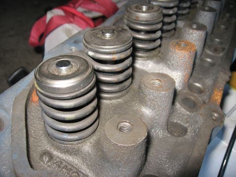 1981 Ford Bronco - Engine cylinder head with valve springs and retainers visible.