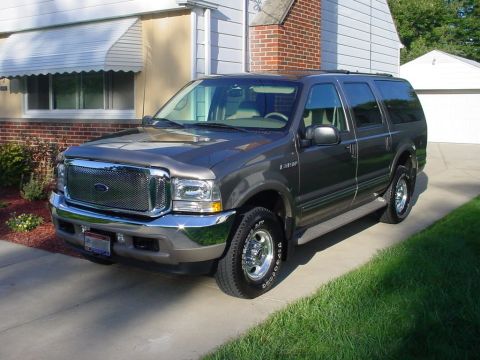 2002 Ford Excursion - All cleaned up next to the house