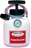 1990 Ford Bronco - A Motive Products Power Bleeder brake bleeding tool with a white plastic tank, a pressure gauge on top, and a black hose with a connector f…