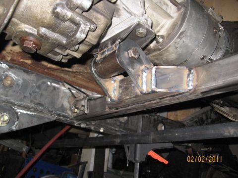 1961 International Scout 800 - Close-up view of a custom transmission crossmember mount, showing welded fabrication details.