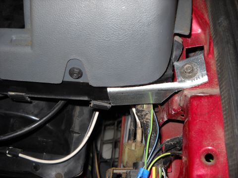 1993 Ford C-150 (Centurion Conversions) - Close-up view of the interior dashboard and exposed wiring in a vehicle.