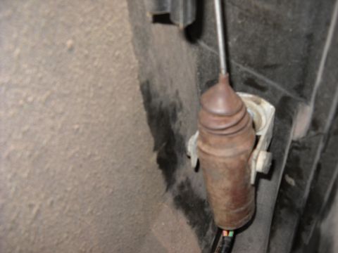 1993 Ford C-150 (Centurion Conversions) - A close-up view of a vehicle's door lock actuator mechanism.